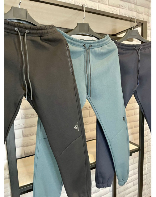 Спортивные штаны Adidas теплые на манжете Спортивные штаны Adidas теплые на манжете